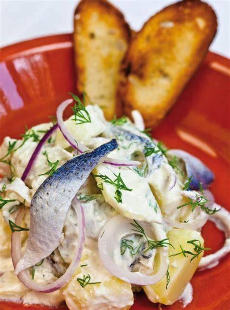 Zure haring met appel op degustatielepels