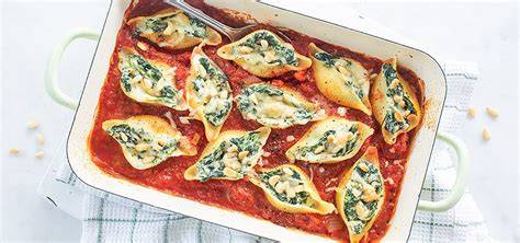 Grote pastaschelpen gevuld met ricotta