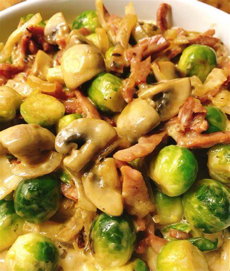 Romige pompoenpasta met spekjes en champignons