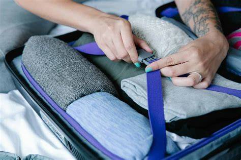 koffer efficiënt inpakken met kleding